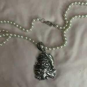 Silver Pearl Santa necklace. 30 inch
